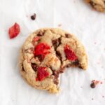 Single Gluten Free Strawberry Chocolate Chip Cookie with bite missing